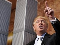 (FILES) This file photo taken on May 18, 2005 shows Real estate developer Donald Trump holding a news conference at Trump Tower, standing next to a nine-foot model of his proposed Twin Towers II, an alternative to the Freedom Tower design that was approved by the city to be built on Ground Zero.   Donald Trump said on November 9, 2016 he would bind the nation's deep wounds and be a president "for all Americans," as he praised his defeated rival Hillary Clinton for her years of public service. / AFP / TIMOTHY A. CLARY